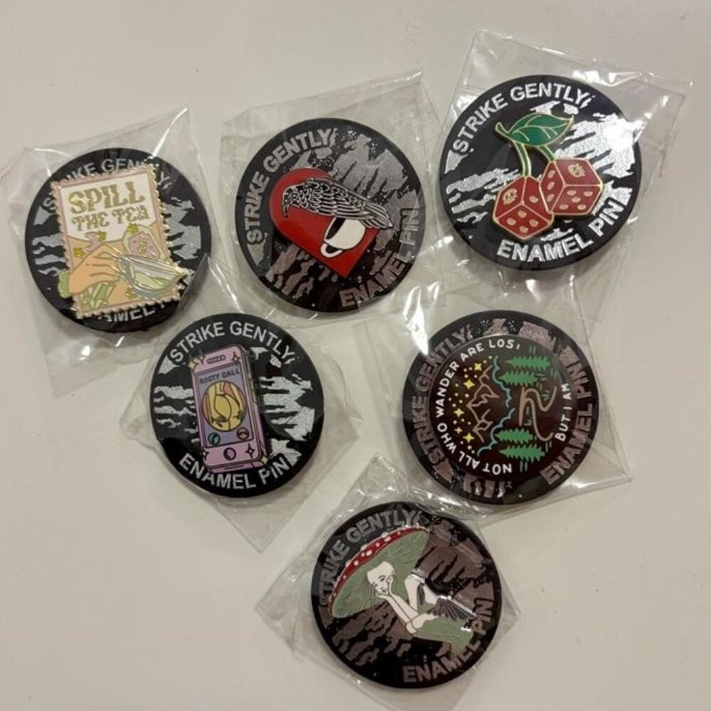 Bundle of Strike Gently Co Enamel Pins